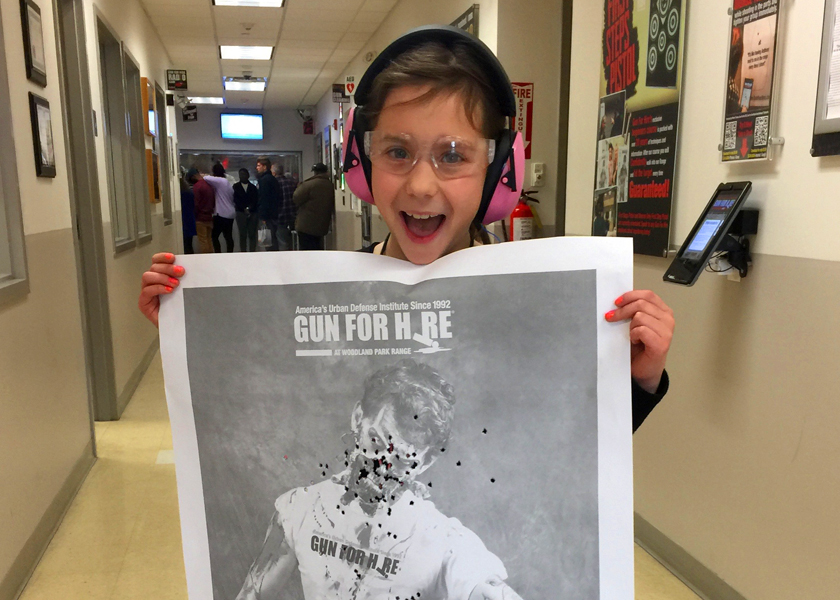 Girl at gun range - corona virus precautions