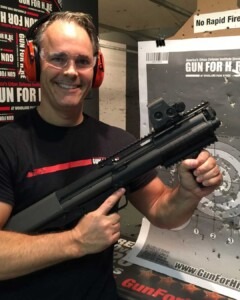 NY visitors holding their legally owned firearm case at Gun For Hire indoor range