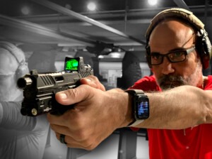 Instructor demonstrating handgun training at Gun For Hire indoor shooting range in New Jersey