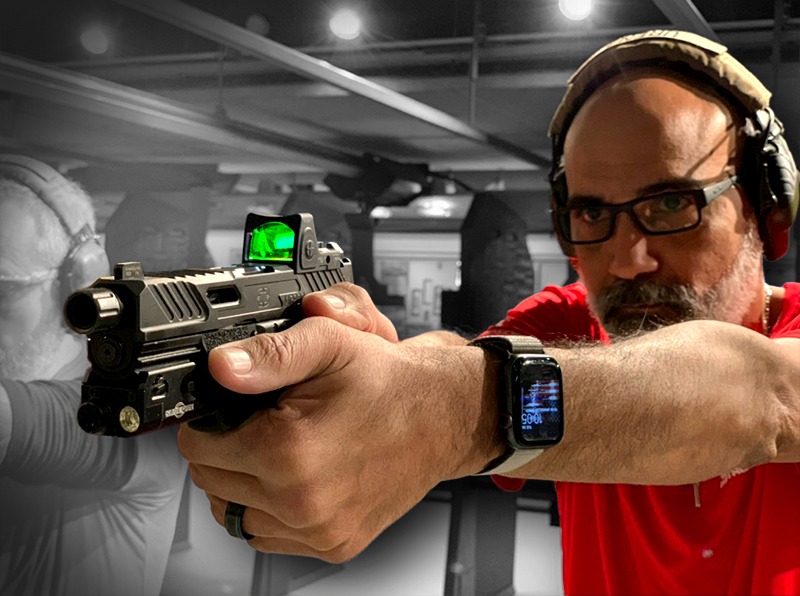 Instructor demonstrating handgun training at Gun For Hire indoor shooting range in New Jersey