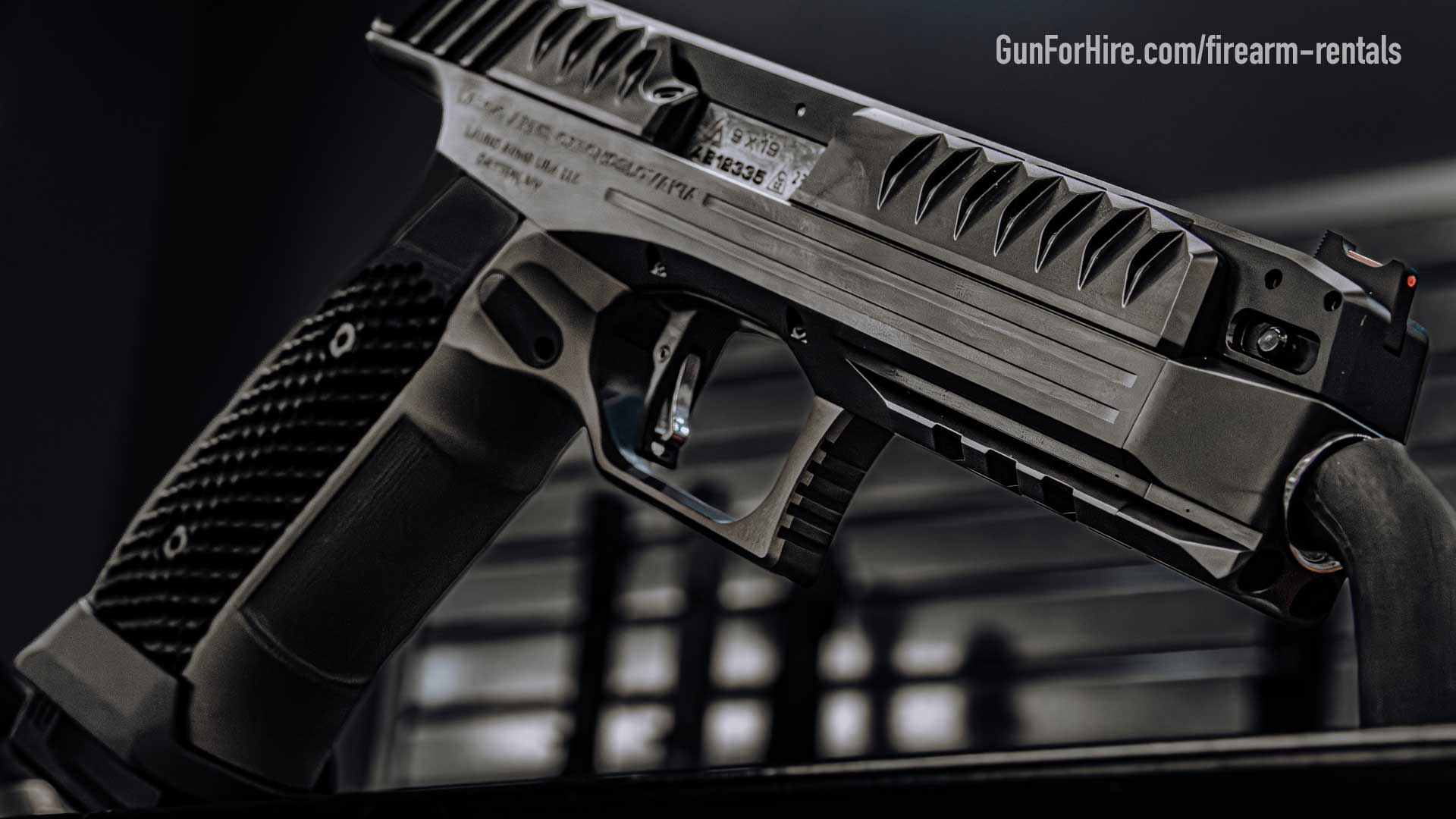 Premium pistol rental on display at Gun For Hire indoor range