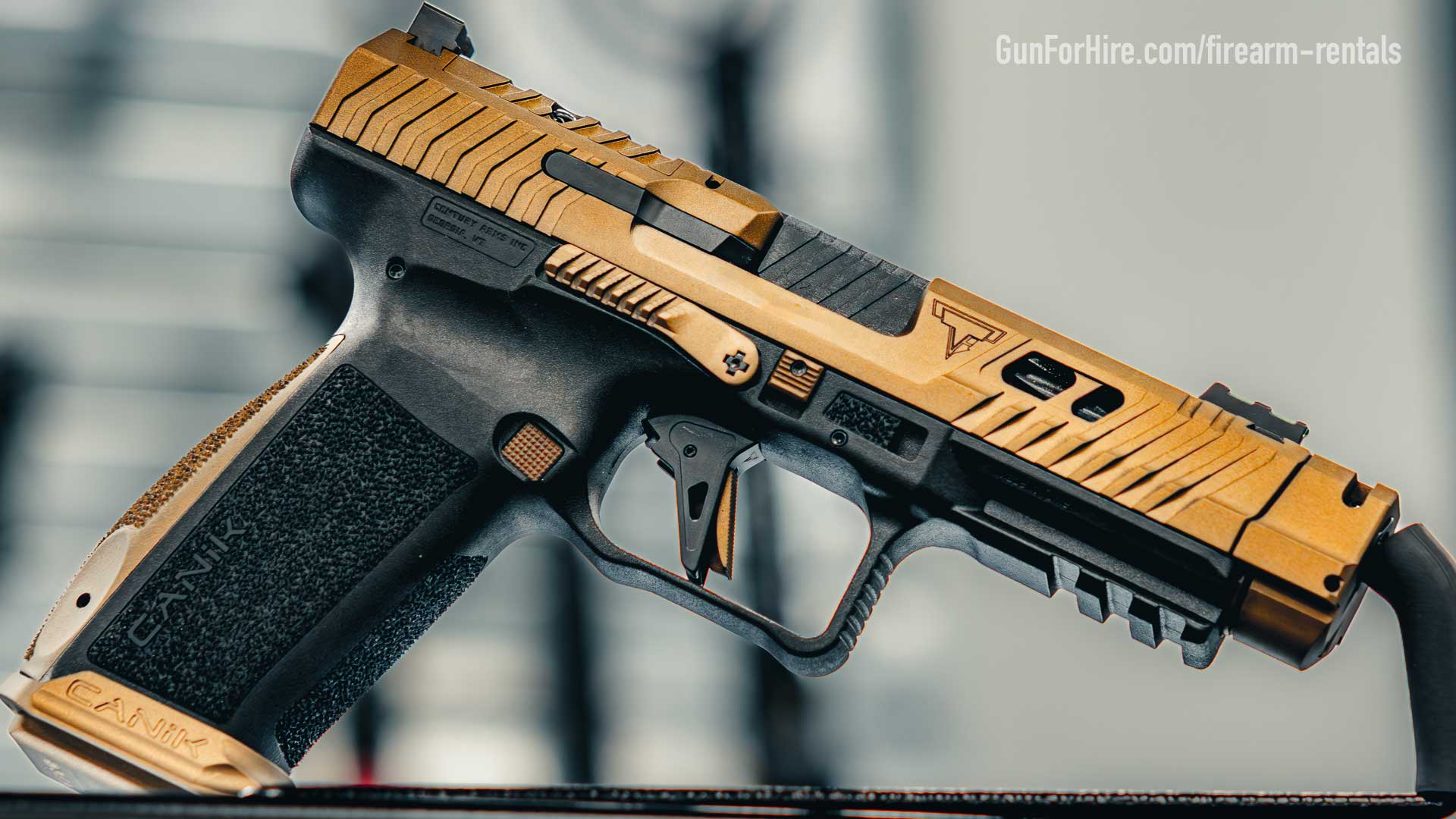 Pistol rental displayed inside Gun For Hire indoor shooting range